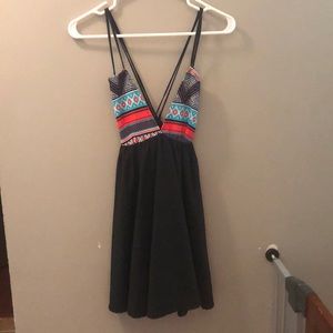 Strappy open back dress.